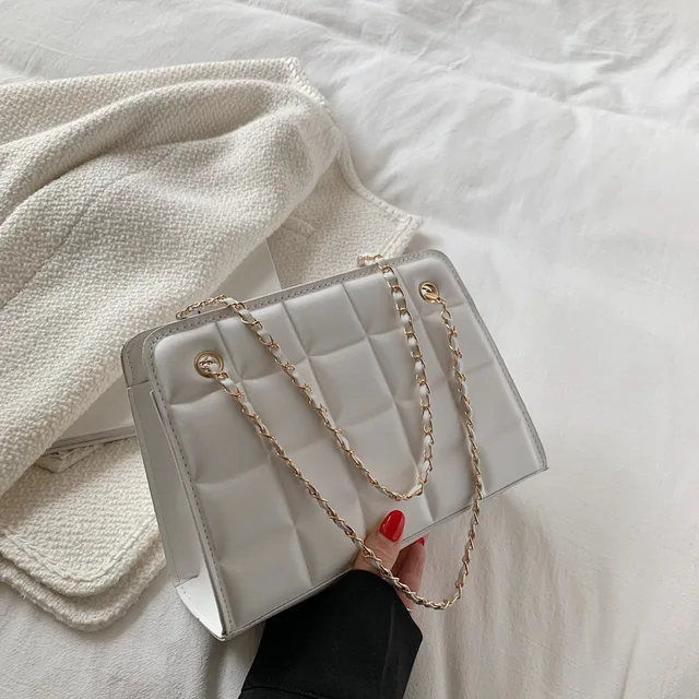 Literary lattice shoulder bag