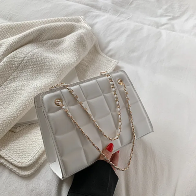 Literary lattice shoulder bag